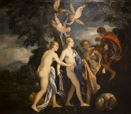 Image of Paris, shadowed at the right, Hera and Aphrodite, all standing, with Pallas Athene perched to the far left on a small, natural form. Pallas Athene's arms are open and she holds a fruit (an apple?) in her right hand. Three angels are above Aphrodite and a light-colored dog rests, curled at the bottom right corner. The figures are in a sparsely wooded area, with a open sky and a mountain in the background.