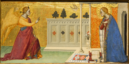 Gabriel appearing before the Virgin - Gabriel, dressed in a red mantle, kneels and extends his right arm while blessing the Virgin. His yellow wings are open. The Virgin stands with her arms crossed opposite Gabriel. She is dressed in a white fur-lined blue mantle and crimson dress. At her feet rests an open book on a red pillow. Between the two is the Dove of the Holy Spirit. Figures stand before a gold columned portico.