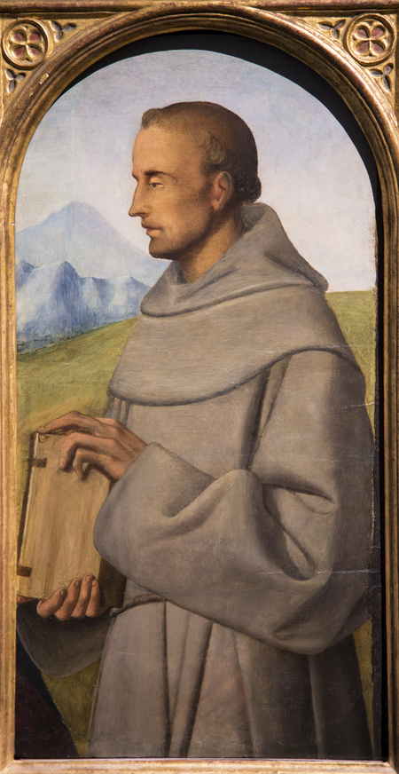 Painting of St. Anthony, in profile, standing before a landscape and holding a book.